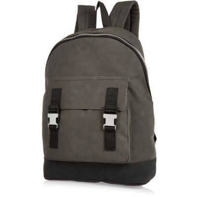Dark green buckled backpack